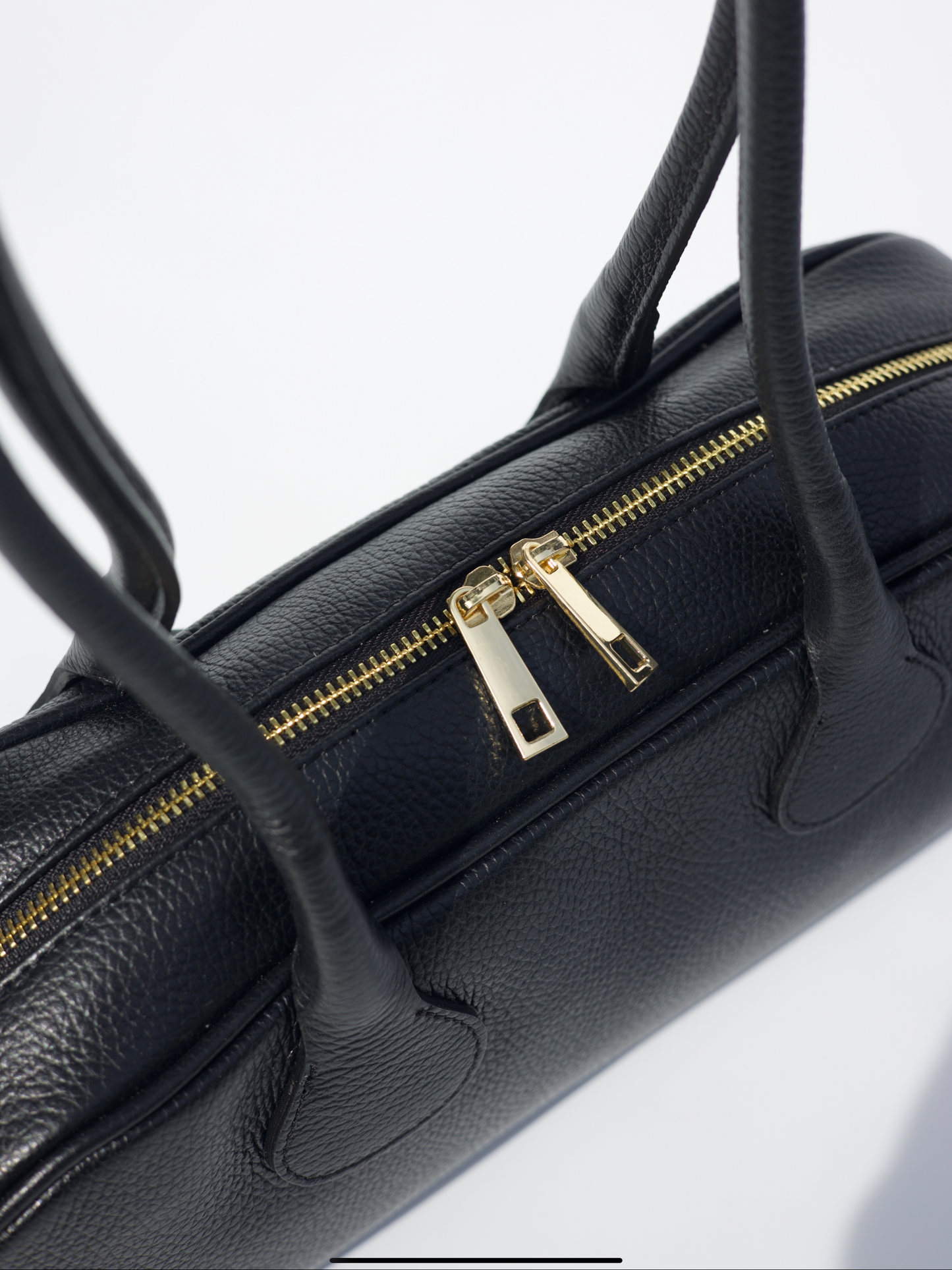 Nina East West Leather Shoulder Bag in  Black